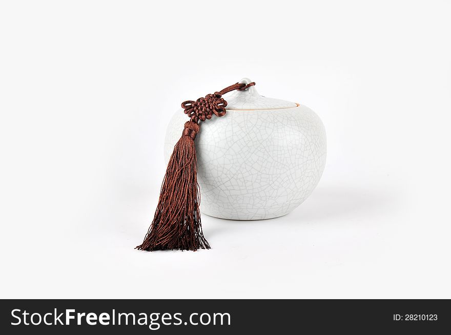 A ceramic jar on a white background