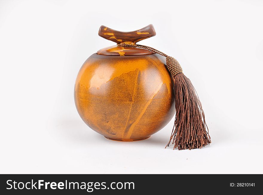 A ceramic jar on a white background