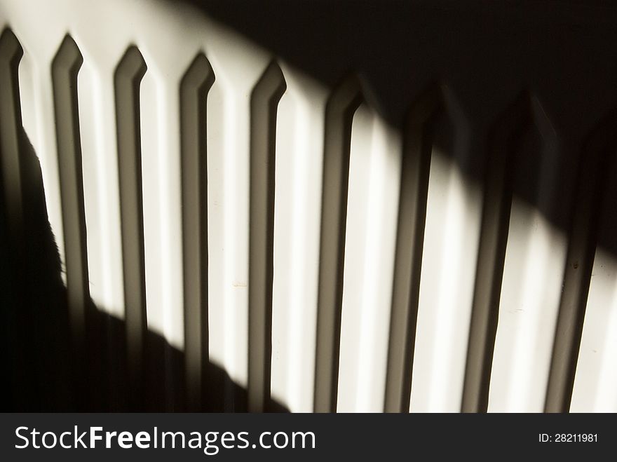 Metal pattern of straight lines in light and shadow abstract background. Metal pattern of straight lines in light and shadow abstract background