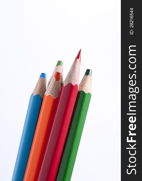 Colour pencils. Concept with leader