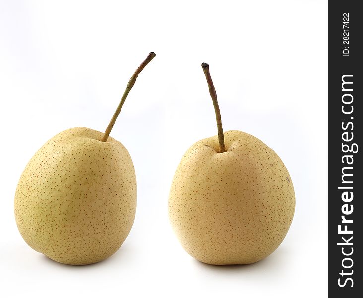 Closeup photo of two fully ripe, fleshy organic pears on white background. Closeup photo of two fully ripe, fleshy organic pears on white background
