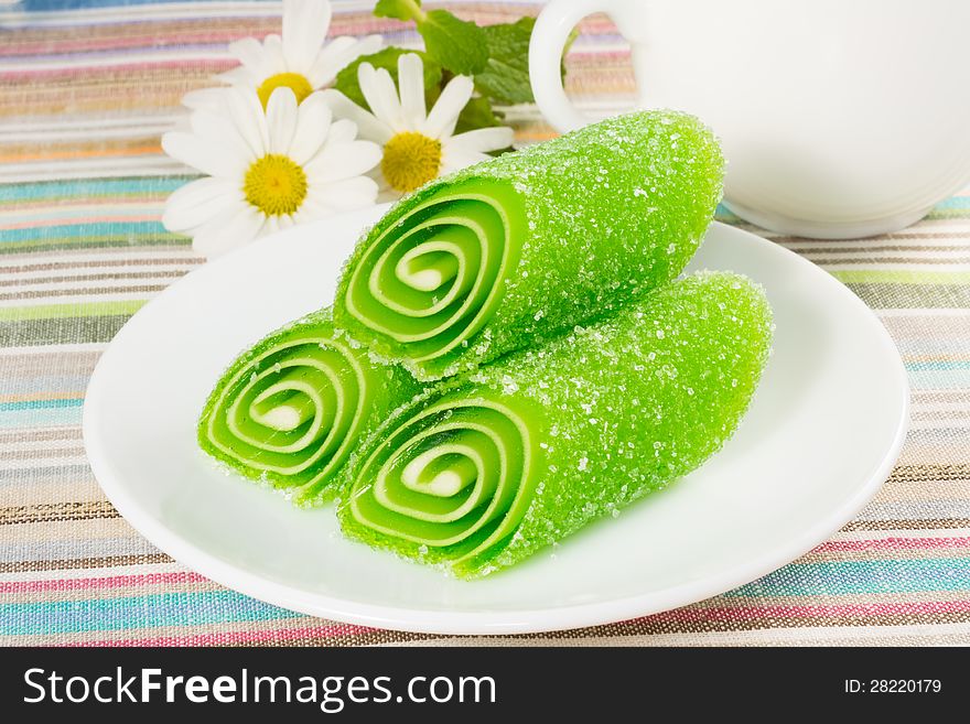 Green Fruit Candy on a plate, closeup