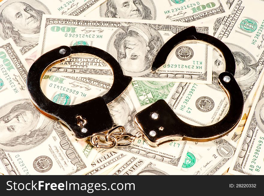 The handcuffs are on the chaotic dispersal of U.S. dollar banknotes