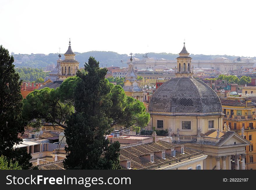 Beaituful view over the city of Rome and the twinchurches Santa Maria in Montesanto and Santa Maria dei Miracoli. Beaituful view over the city of Rome and the twinchurches Santa Maria in Montesanto and Santa Maria dei Miracoli