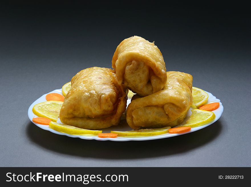 Chinese bread in a plate on a gray background