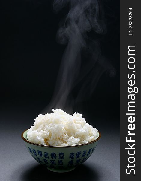 Chinese white rice in plate on neutral background
