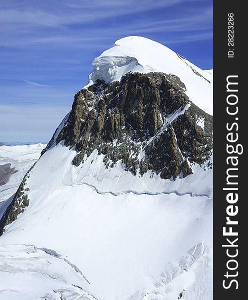 The snow capped summit of Breithorn at 4,159m. The snow capped summit of Breithorn at 4,159m