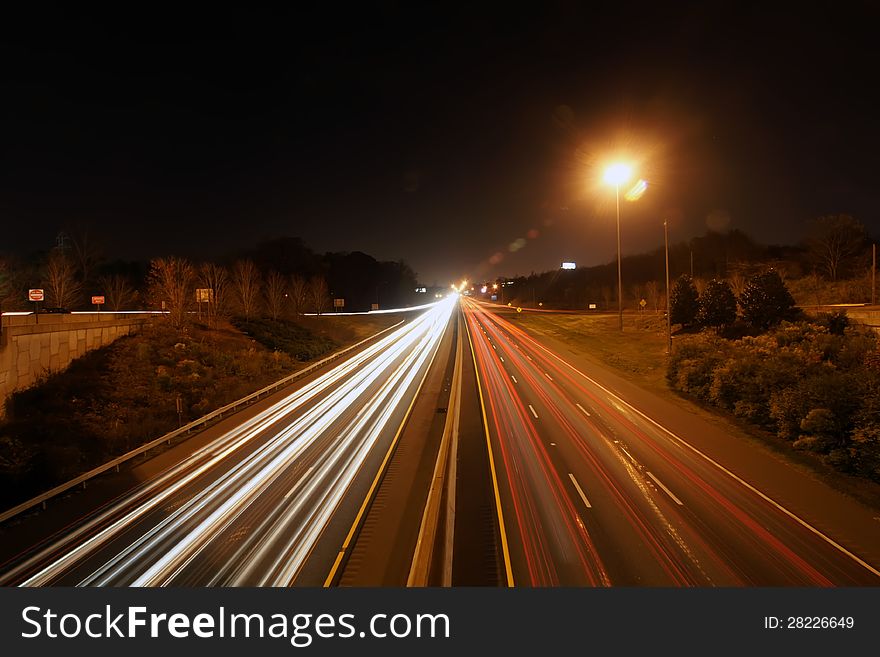 Evening traffic on highway light trails