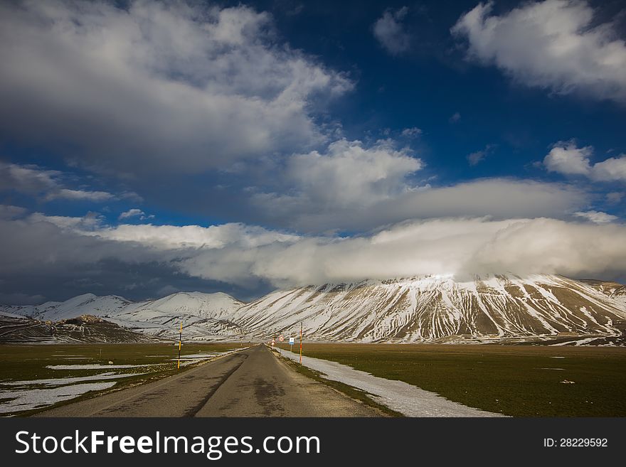 Mountain road panorama captured in Castelluccio di Norcia. Mountain road panorama captured in Castelluccio di Norcia