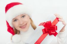 Woman And Christmas Present, White Gift With A Red Ribbon Royalty Free Stock Photography Woman And Christmas Present, White Gift With A Red Ribbon Royalty Free Stock Photography