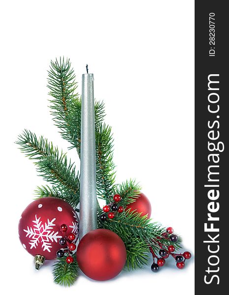 Vertical christmas composition with a silver candle