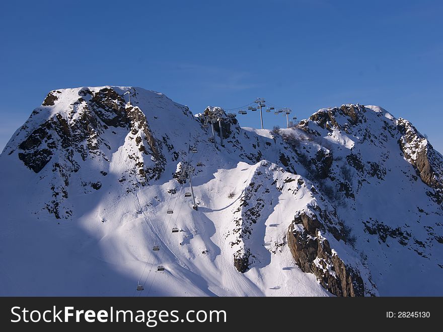 Mountains With A Cable Car In The Far