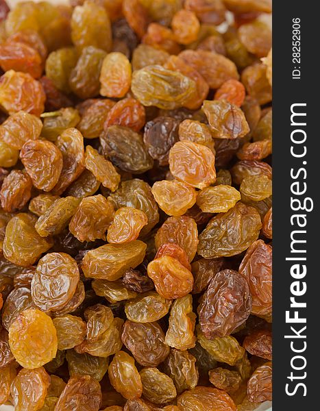 Light sultana raisins closeup background. Light sultana raisins closeup background