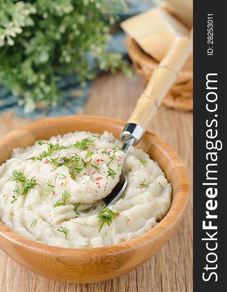 Mashed Potatoes And Cabbage In A Wooden Bowl On The Table, Close