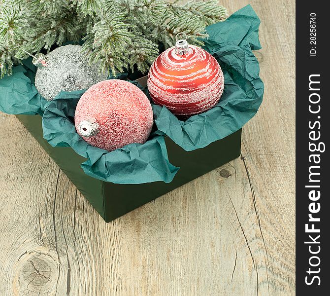 Christmas ball.
Christmas decoration over wooden background.