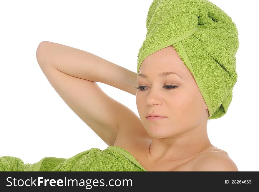 Spa Girl. Beautiful Young Woman After Bath with green towel. isolated on white