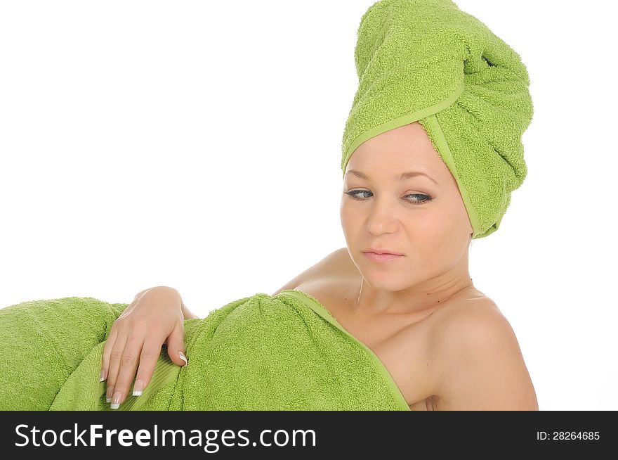 Spa Girl. Beautiful Young Woman After Bath with green towel. isolated on white.