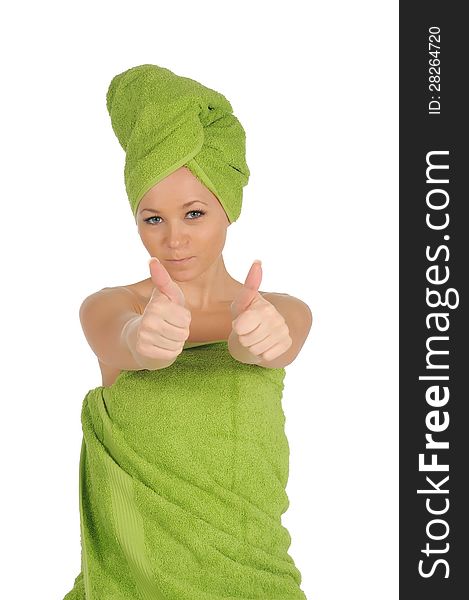 Spa Girl. Beautiful Young Woman After Bath with green towel. isolated on white