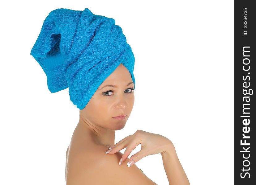 Spa Girl. Beautiful Young Woman After Bath with blue towel. isolated on white