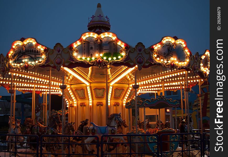 Night view of a carousel in Bucharest.