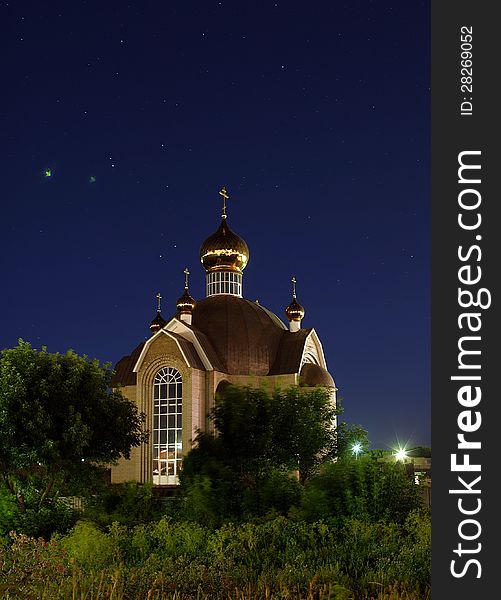 Beautiful and mysterious church on the starry sky