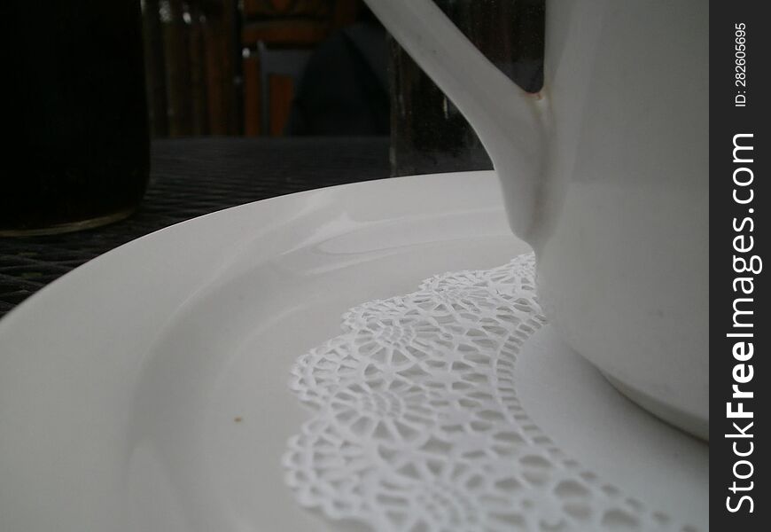 Coffee mug and plate close-up