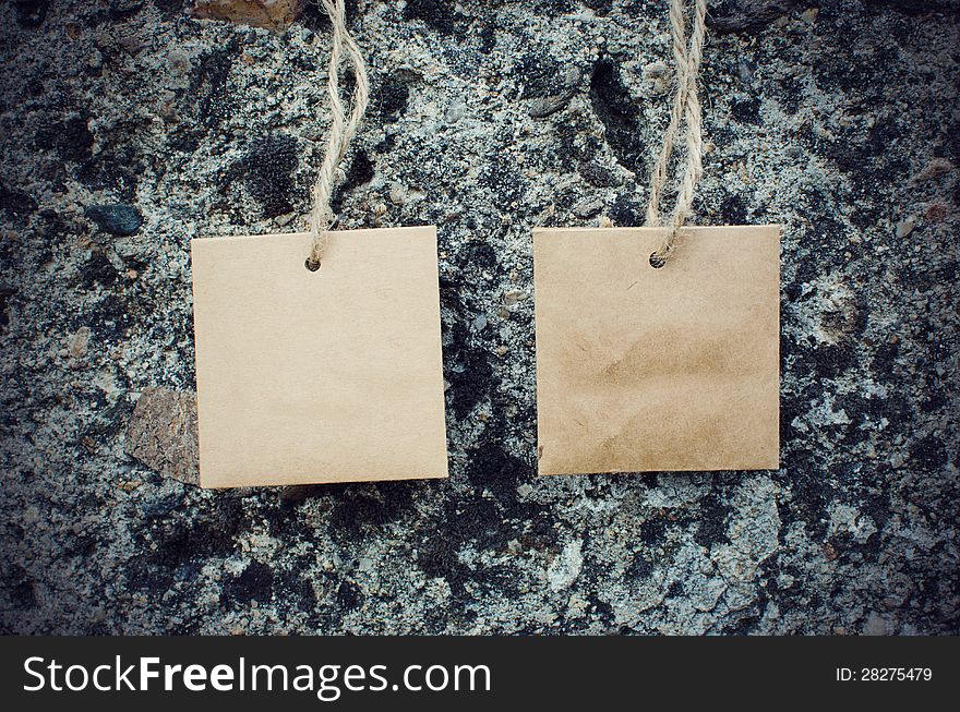 Blank Paper Tags on grungy wall backround. Blank Paper Tags on grungy wall backround