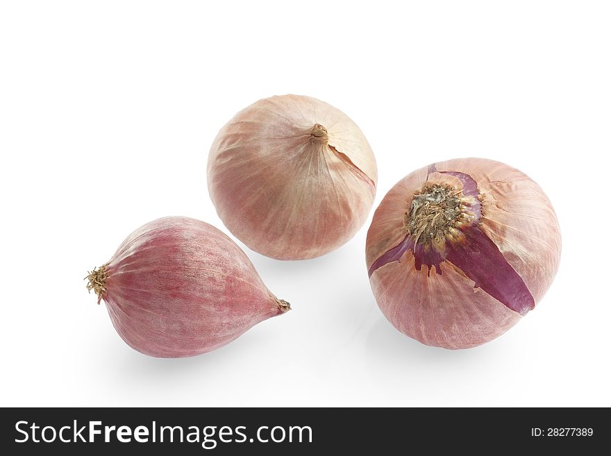 Group of small red shallot on white background