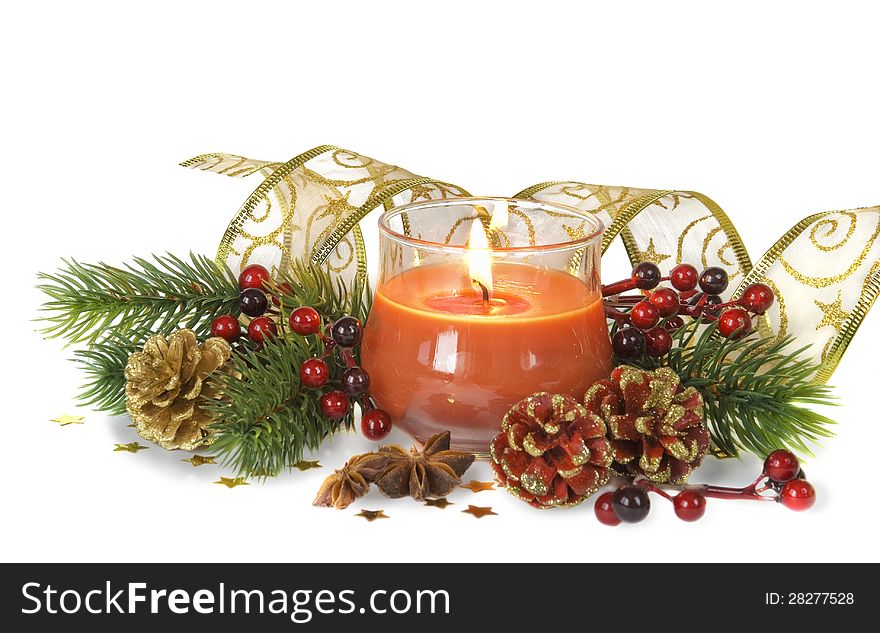 Christmas composition with a burning candle