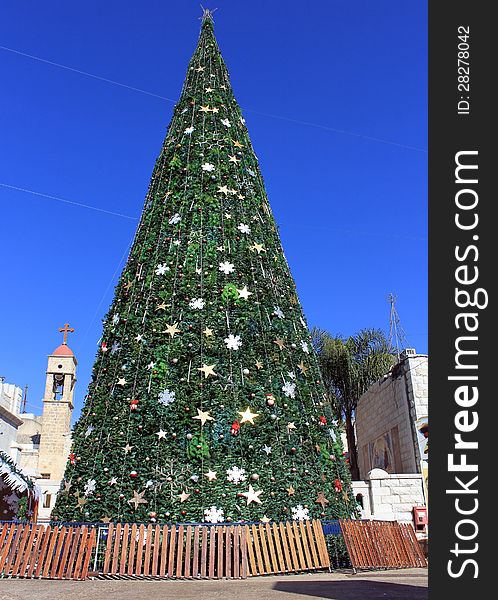 Christmas tree in the square in front of the Greek Orthodox Church of the Annunciation in Nazareth, Israel. Christmas tree in the square in front of the Greek Orthodox Church of the Annunciation in Nazareth, Israel