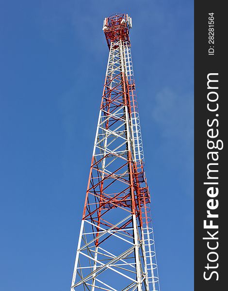 Antenna radio wave transmissions. Bright blue sky. Antenna radio wave transmissions. Bright blue sky.