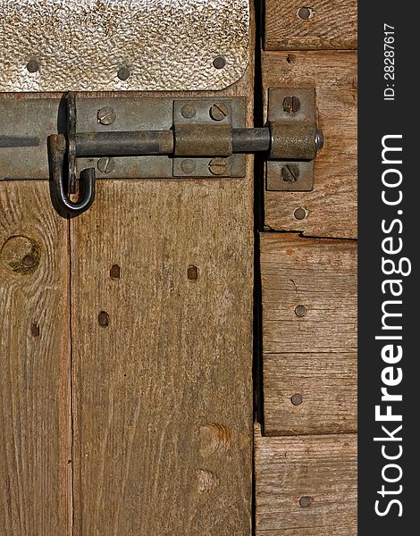 Wooden stable door detail wooden texture and metal lock