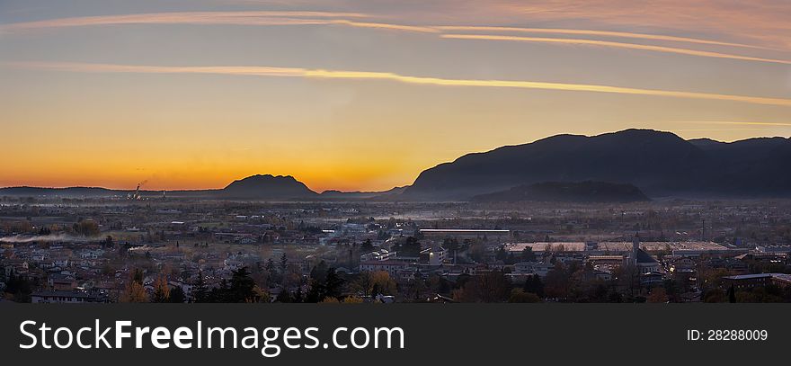 Sight of osoppo (udine), to the sunset, from the town of Gemona of the friuli (udine) italia