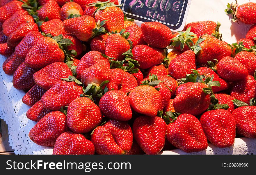 Fresh juicy strawberries at a market in Madrid. Fresh juicy strawberries at a market in Madrid
