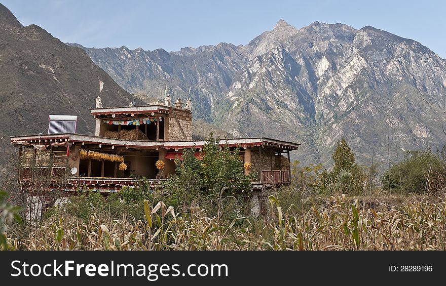 A Tibetan folk house at the foot of mountain