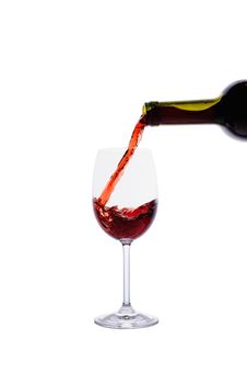 Red Wine Pouring Into Wine Glass Royalty Free Stock Image