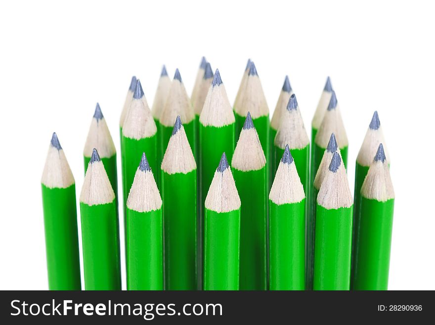 Green pencil with black pencil on a white background. Green pencil with black pencil on a white background