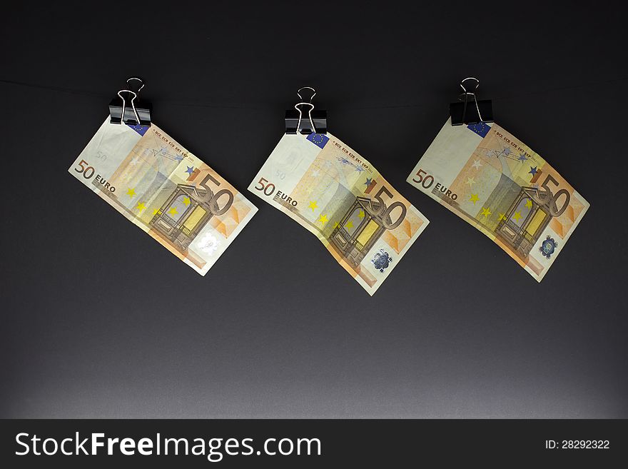 Hanging Euro on a string