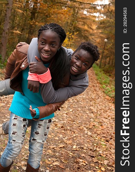 Happy foster children in the forest are having fun. Happy foster children in the forest are having fun