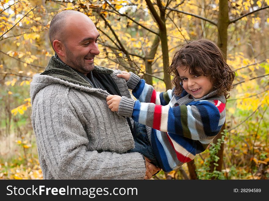 Happy foster children in the forest are having fun. Happy foster children in the forest are having fun