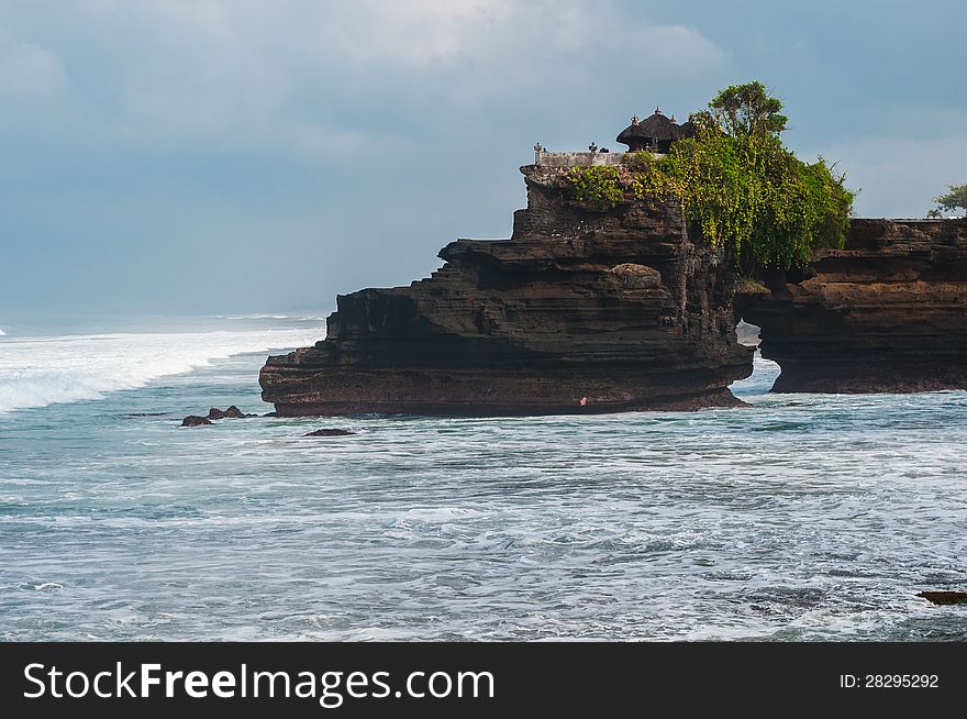 Pura Batu Bolong - small hindu temple near Tanah Lot, Bali, Indonesia. Pura Batu Bolong - small hindu temple near Tanah Lot, Bali, Indonesia