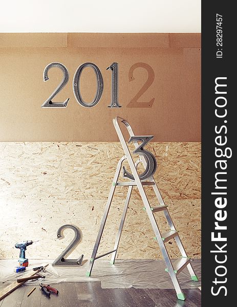 The New Year Is Coming Concept - Numbers 2013 Instead Of 2012