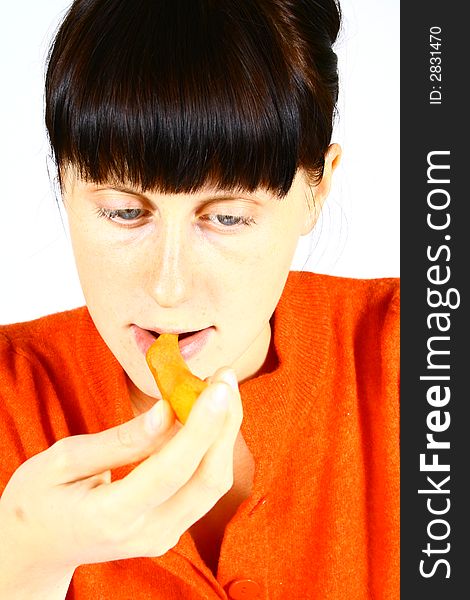 Young Girl Eating Fresh Carrot