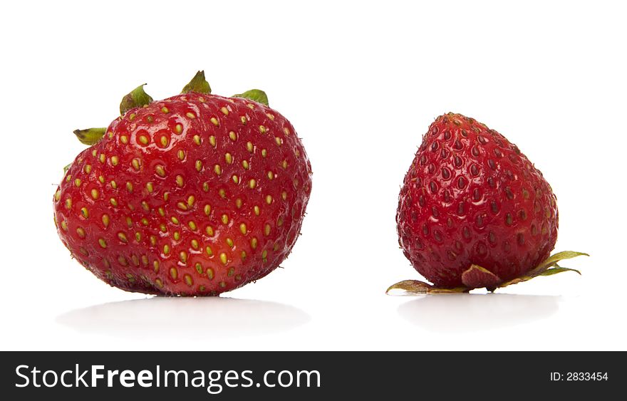 Colorful strawberries isolated over white background