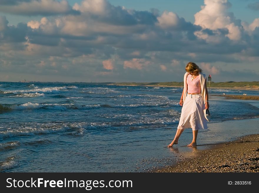 Attractive blond girl at the seaside. Attractive blond girl at the seaside