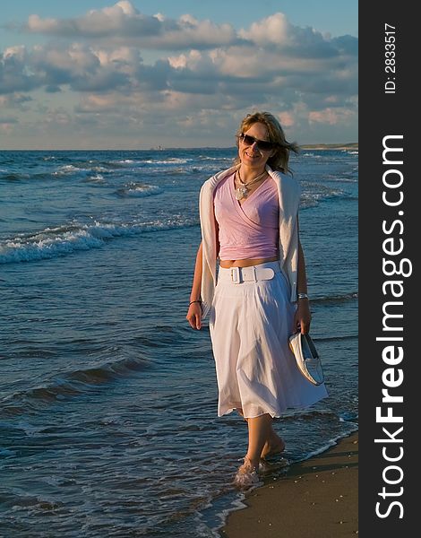 Attractive blond girl at the seaside. Attractive blond girl at the seaside