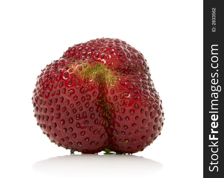 Close-up of a strawberry over white background
