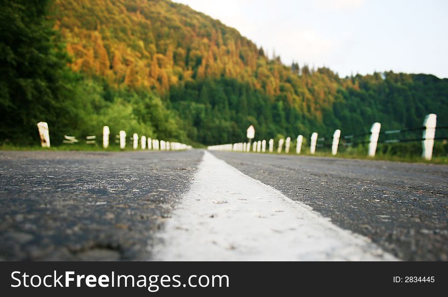 Mountain landscape - empty highway in autumn