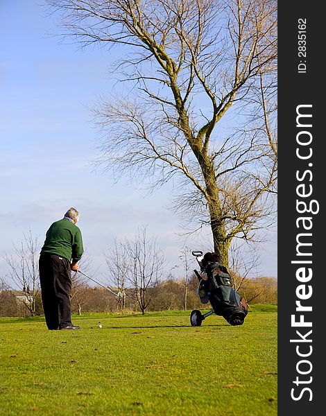 photo of a golfer who is ready to shoot