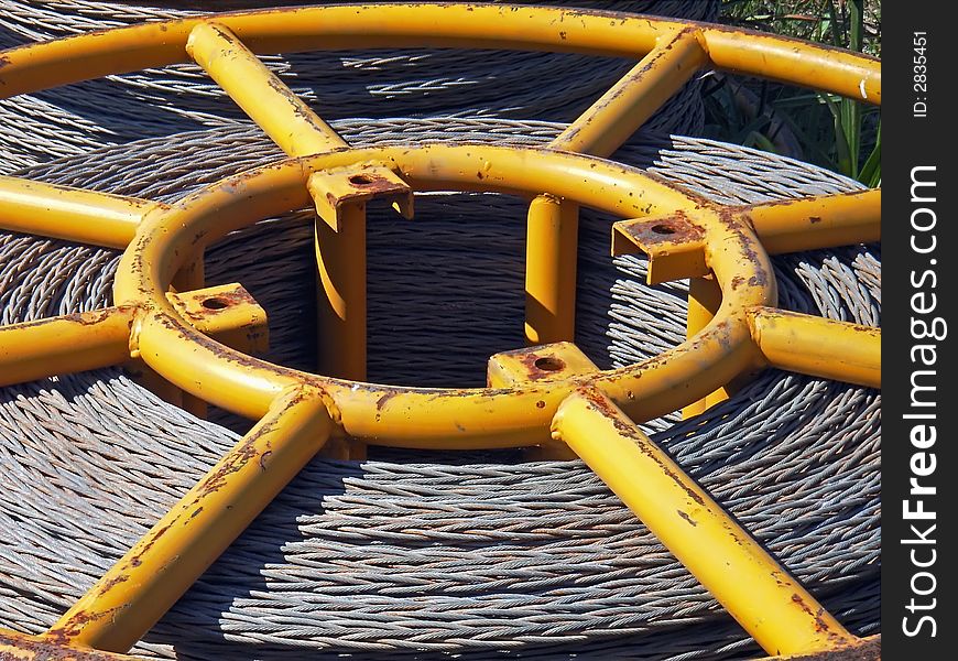 Core of a bobbin containing steel cable. Core of a bobbin containing steel cable